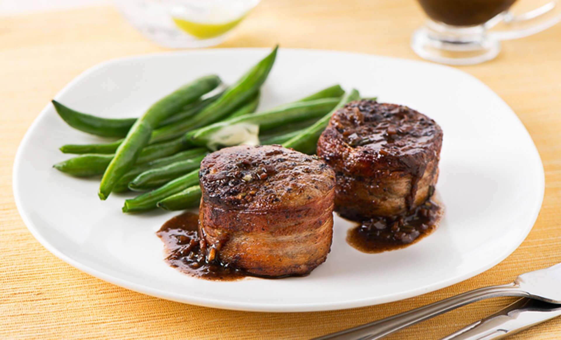 Bacon Wrapped Peppercorn Pork Tenderloin Medallions