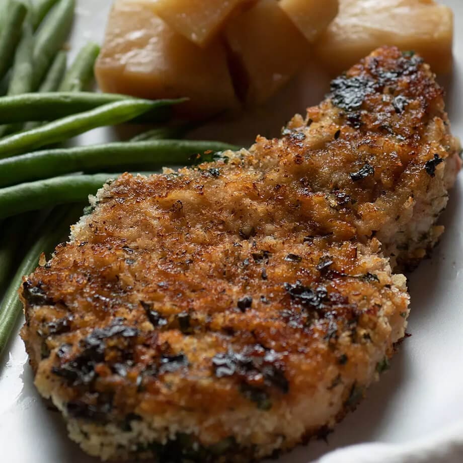 Why People Eat Pork On New Year's Day: The Story Behind the Tradition 3 crusted chops with green beans and sweet potato