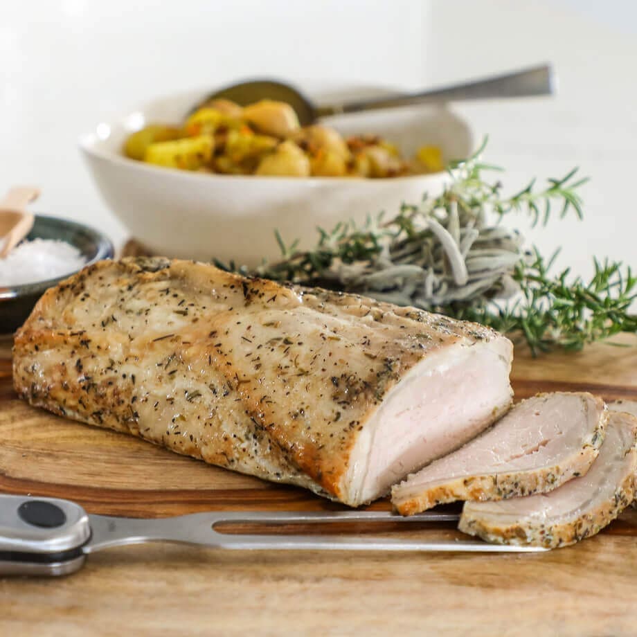 Seasoned pork loin on a cutting board