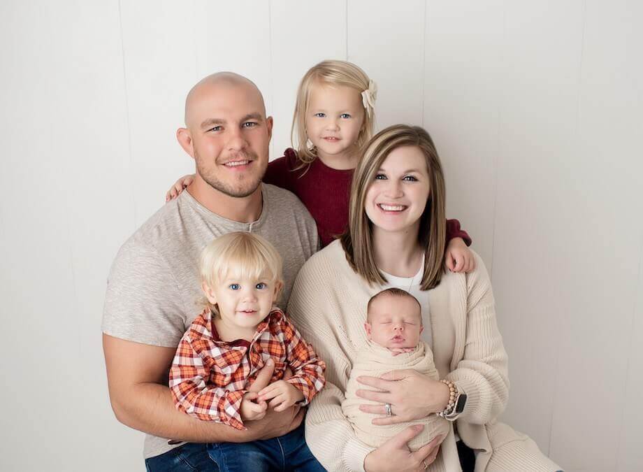 Ethical Farming: How the Brandt Family Farm Is Reshaping the Landscape 2 Joe Brandt posing for a photo with his wife and kids